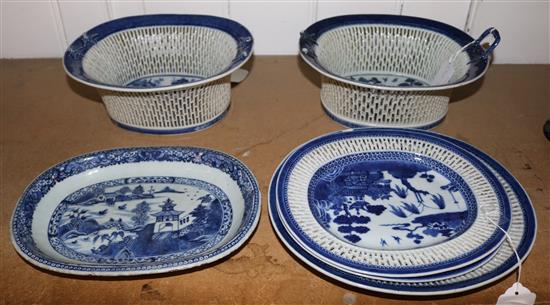 Two Chinese export blue and white chestnut baskets, three stands and a dish, Qianlong period, baskets 25.5cm, handles detached(-)